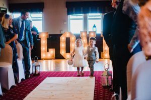 children walking down the aisle