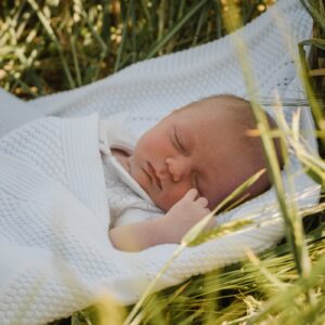 baby asleep outdoor family session