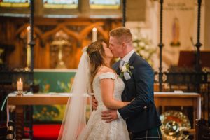 first kiss of newlyweds