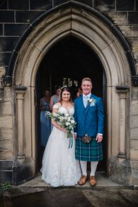 bride and groom leaving the church