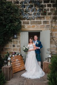 bride and groom arrive at the chilli barn