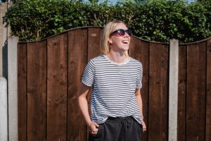 lady laughs into the sun