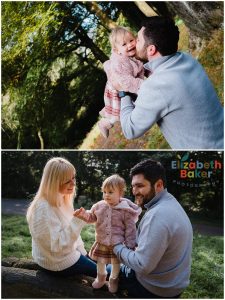 baby and father playing in the woods