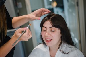 bride getting ready in the morning before the wedding at The Fleece Inn