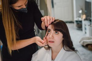 bride getting ready in the morning before the wedding at The Fleece Inn
