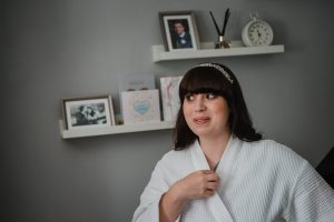 bride getting ready in the morning before the wedding at The Fleece Inn