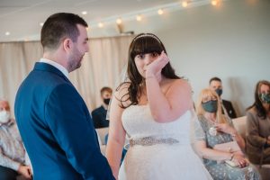 bride gets a bit upset during the wedding ceremony