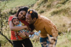 parents playing with baby