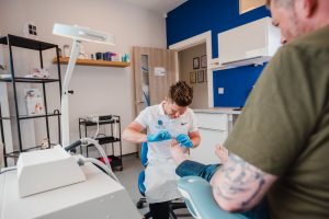 close up of chiropodist treating a patients feet