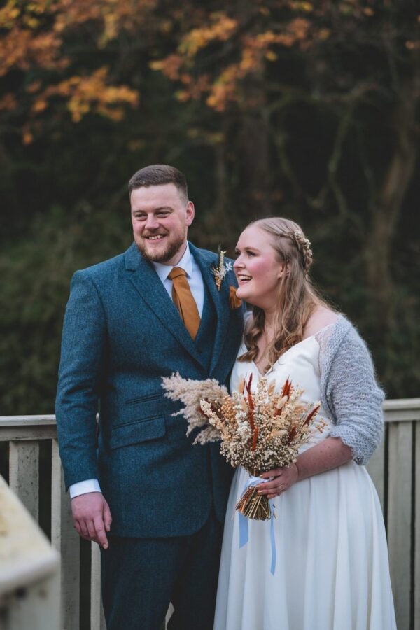 outdoor portraits of the wedding couple at their winter wedding