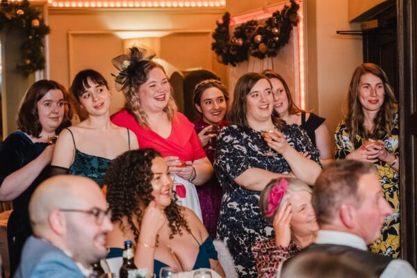 Friends look on during the speeches at Whitley Hall near sheffield