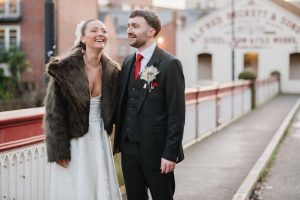 newlyweds go for a walk after their wedding in Kelham Island Sheffield